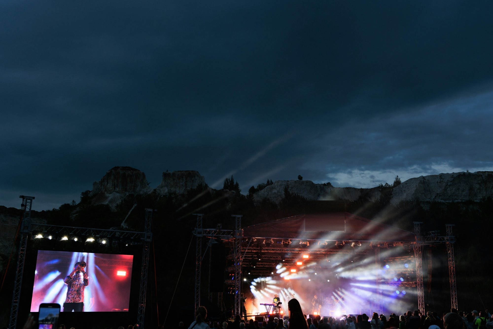 Outdoor concert at night with mountain backdrop — Deer Valley Music Festival
