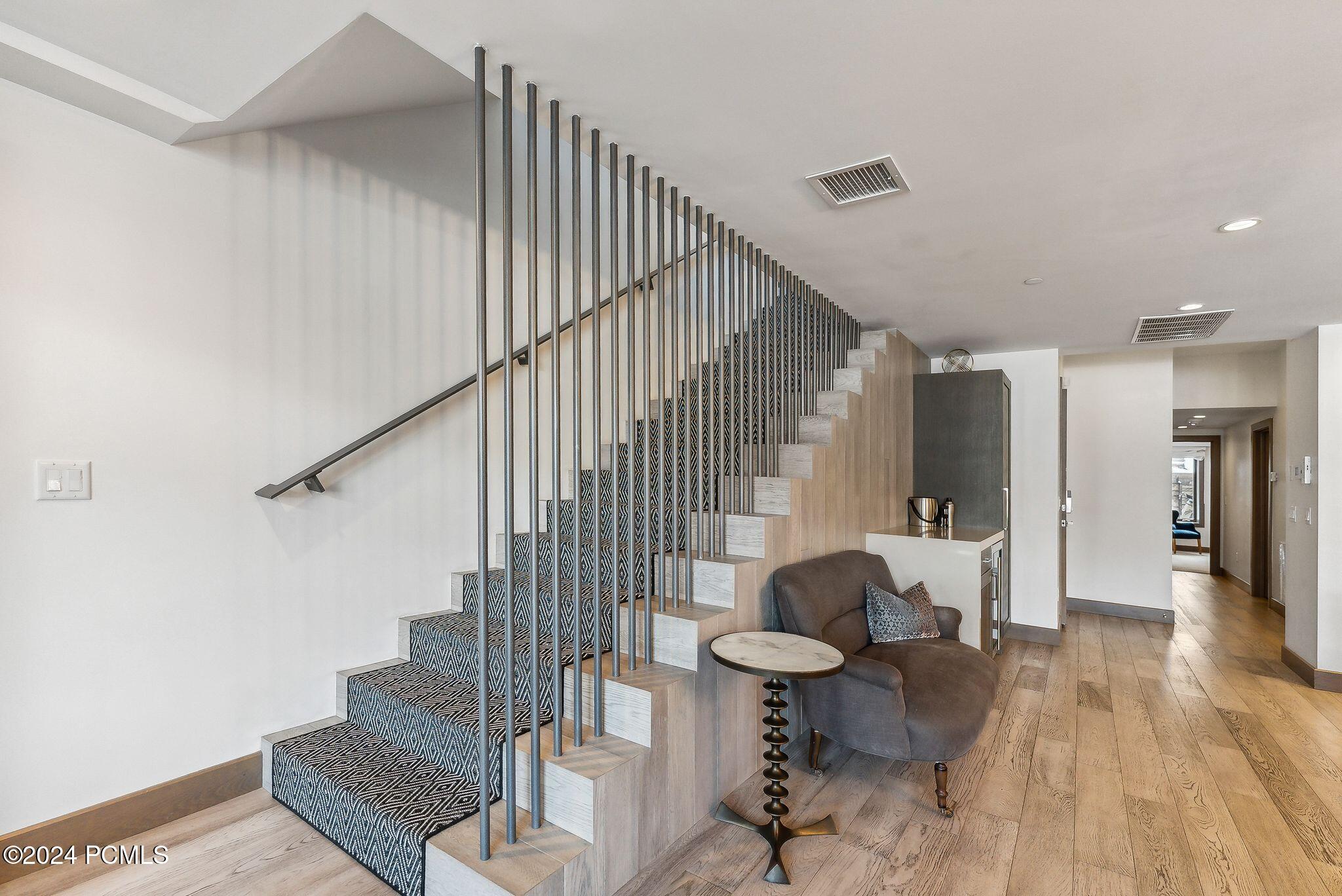 Modern interior staircase with designer runner