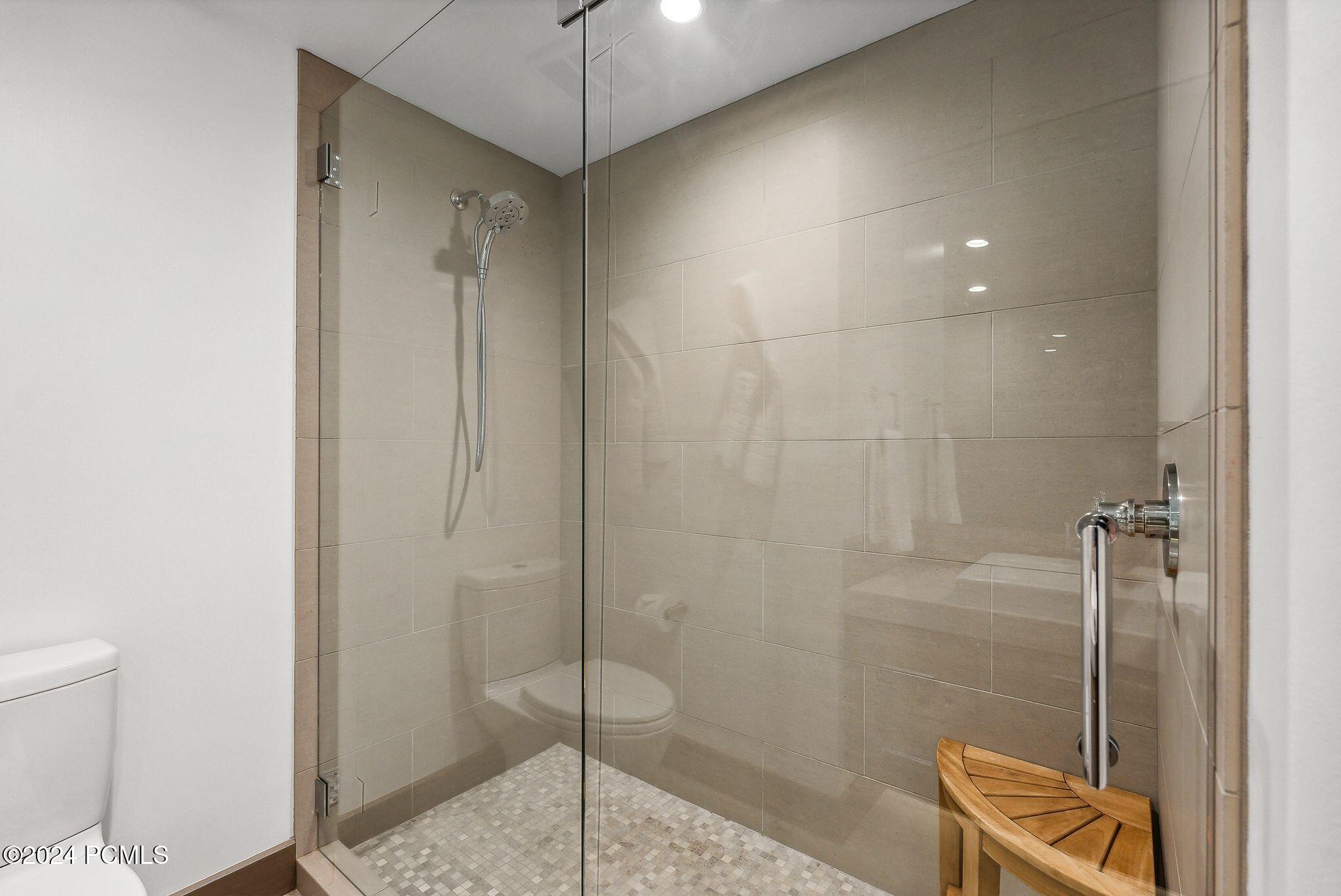 Movie room en-suite bathroom with walk-in shower